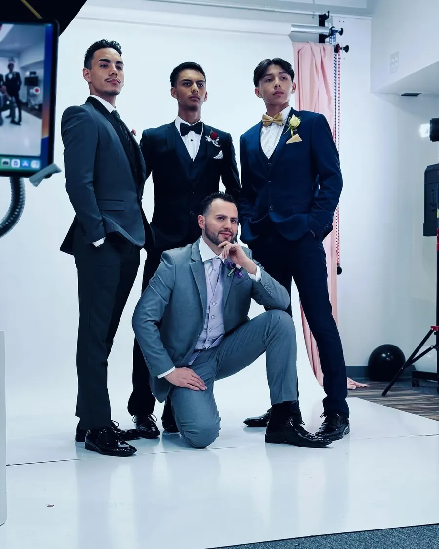 Charcoal, black, navy and light grey suits together
