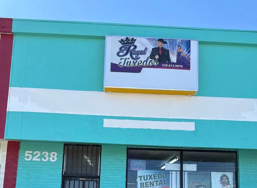 The Royal Tuxedos storefront on South 12th Avenue, with the crown sign above the door